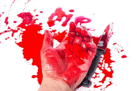 hand with blood and knife isolate on whiteの写真素材