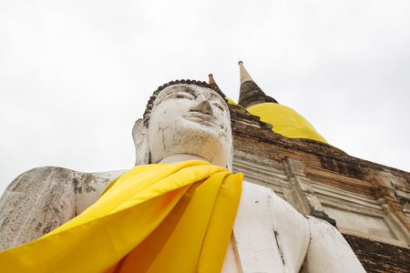 Pagoda and Buddha Status at Wat Yai Chaimongkol, Ayutthaya, Thailandの写真素材