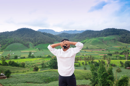 Man looking at mountainの写真素材
