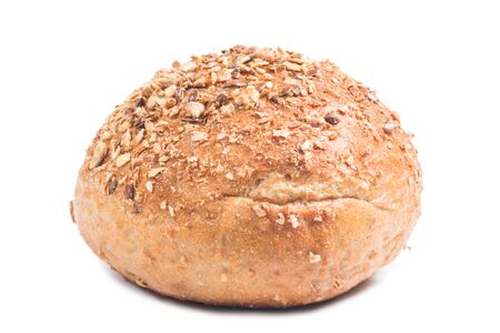 Fresh whole grain bread cut in half on white backgroundの写真素材
