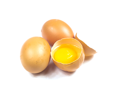 Broken egg isolated on white backgroundの写真素材