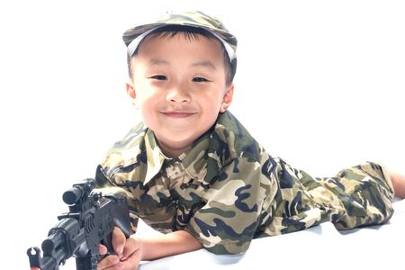 little boy with Soldier suit isolated on white backgroundの写真素材