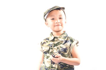 little boy with Soldier suit isolated on white backgroundの写真素材