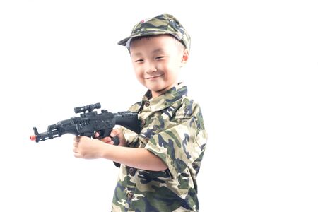 little boy with Soldier suit isolated on white backgroundの写真素材