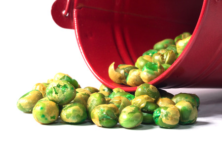 Green pea scattered on whiteの写真素材