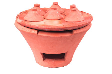 Traditional stoves and pots set made of red clay for make Kind of Thai sweetmeat. Coconut milk mix with powder fried dessertの写真素材