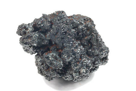 detailed macro photo of Hematite mineral (sacred mineral) isolated over whiteの写真素材