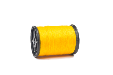 thread and sewing needle isolated on white backgroundの写真素材