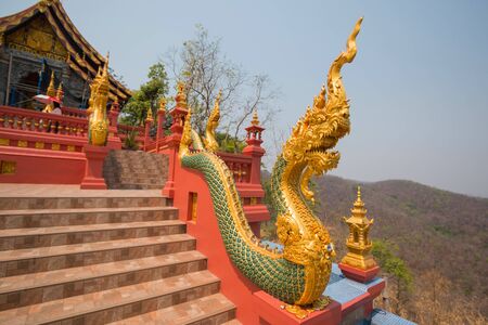 serpent in the staircase in front of the Thai templeの写真素材