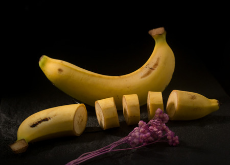Fresh Yellow banana is Delicious isolate on Black backgroundの写真素材