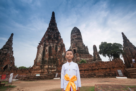 Asian boy wearing thai dress in ancient templeの写真素材