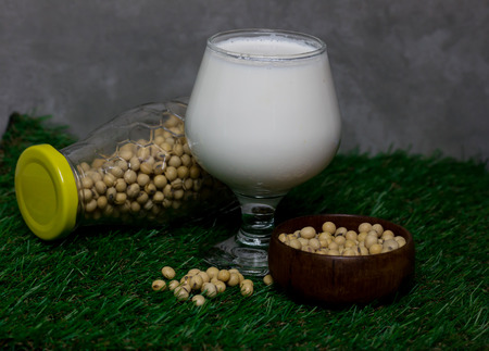 soybean milk and Soybean  isolate on green grass background