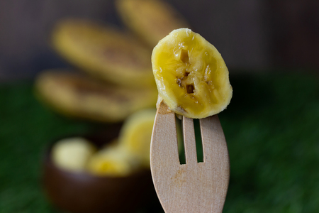 Sweet golden banana fruit isolate on Green grassの写真素材