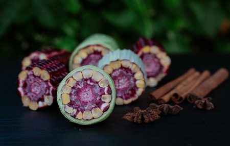 Fresh Purple corn fruit from Thailand garden  On the black wood tableの写真素材