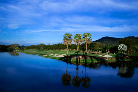 View of the golf course with Beautiful reservoirの写真素材