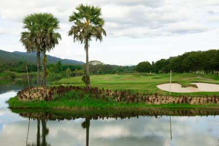 View of the golf course with Beautiful reservoirの写真素材