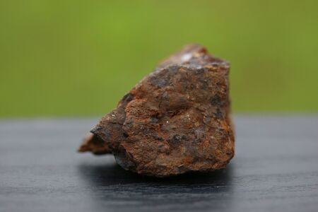 minerals of Iron Rock minerals for industry isolate on green backgroundの写真素材