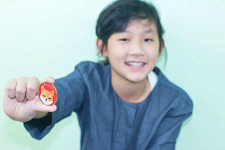 cute Thai girl happily with  Cryptocurrency