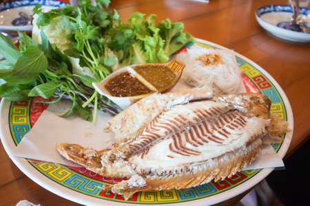 Fried fish with chili sauce on the plate.Thai foodの写真素材