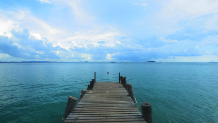 Wooden Boardwalk on the seaの写真素材