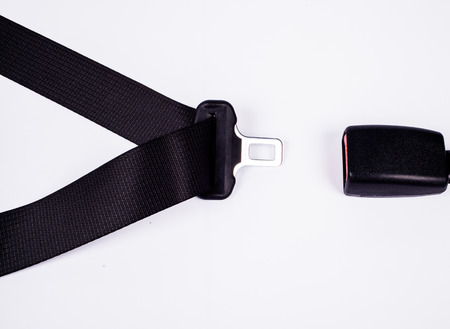 Opened seat belt. All on white background.の写真素材