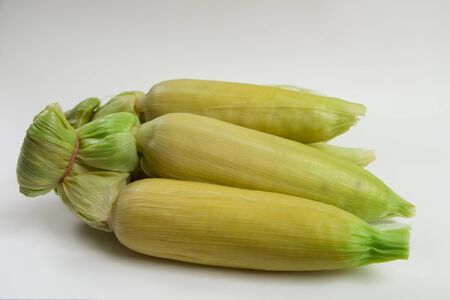 Boiled corn on White Backgroundの写真素材