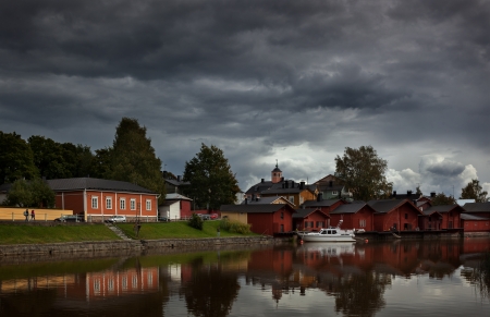 Wooden huts on bank of river in a historic town of Porvoo, east of helsinki, finlandの写真素材