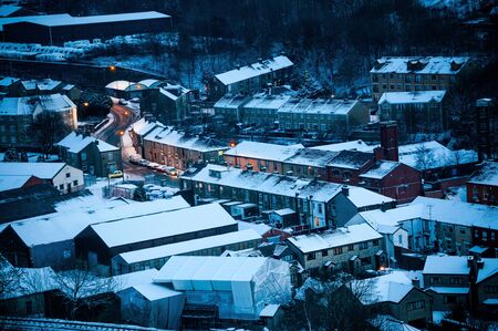 An aerial view of British rural town during winter 
