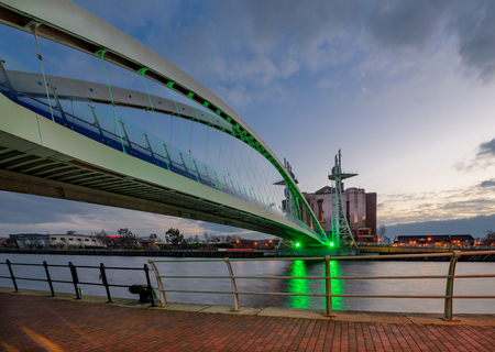 Millennium Bridge is a pedestrian and cyclist bridge in Salforq Quays, Manchester , Englandのeditorial素材