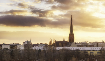 Panoramic view of Berlin skyline and dramatic clouds at sunset.の写真素材