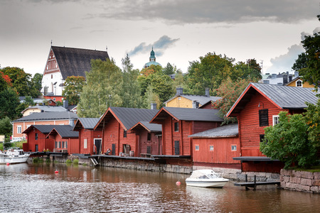 Classic old wood houses and church. Riverside view at Porvoo, Finlandのeditorial素材