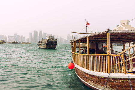 Wooden boats takes the tourist around doha seaside. Qatar.の写真素材
