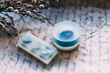 spring bouquet willow and handmade soap in white blue colorsの写真素材