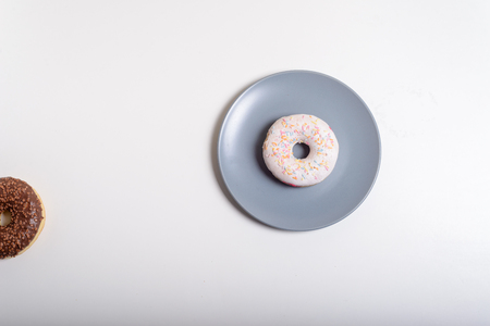 glazed doughnut isolated over white, view topの写真素材