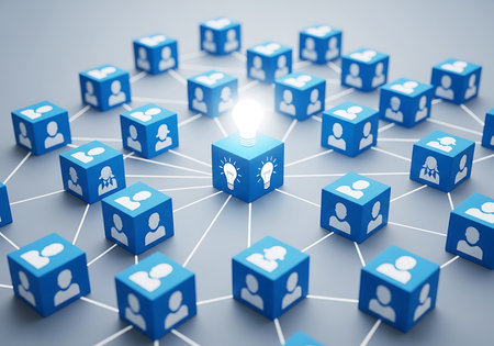 Network of blue cubes with people icons and a central glowing lightbulb connectionの素材