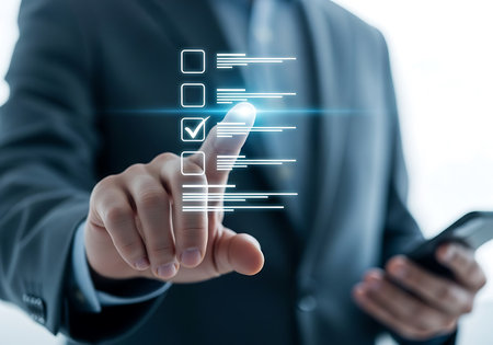 A man's hand in a dark suit touches a glowing digital checklist with a checkmark on a futuristic interface.の素材