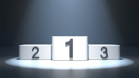A white podium with numbers 1 2 and 3 is lit by spotlights against a dark grey background.の素材