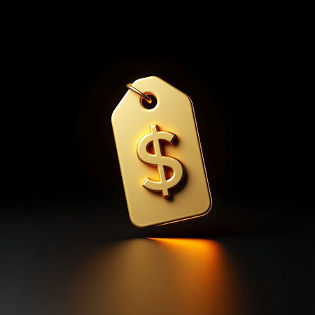 A golden price tag with a raised dollar symbol sits against a dark, reflective surface with a warm orange glow beneath it.の素材
