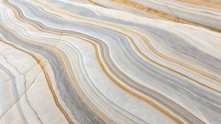 Close-up view of layered sandstone with swirling bands of beige brown grey and white. Cracked texture adds depth to the natural formation.の素材