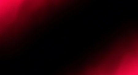 Black background with bright red light streaks on the left and right edges. Subtle dust particles are visible.の素材