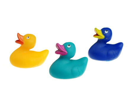 Three colorful ducklings isolated on white backgroundの写真素材