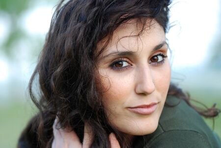 Portrait of a beautiful young woman outdoorの写真素材