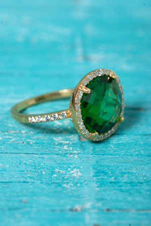 Jewelry ring on old wooden table