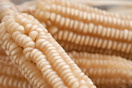 White corn on old wooden table
