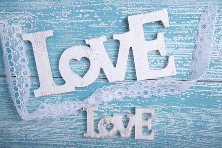 Word LOVE on old wooden backgroundの写真素材