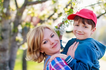 Happy mother with her cute little son の写真素材