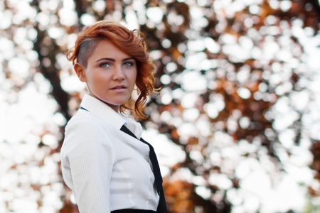 Portrait of sexy redhead studentの写真素材