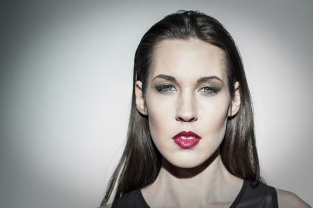 Sensual brunette fashion model portrait, half open mouthの写真素材