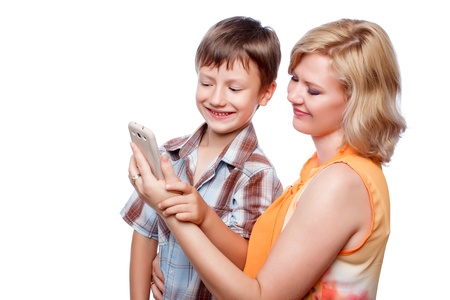 Young mother and son with smartphone, isolated
の写真素材