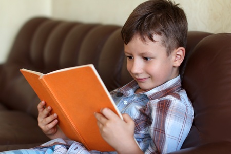 Clever little boy learning readingの写真素材